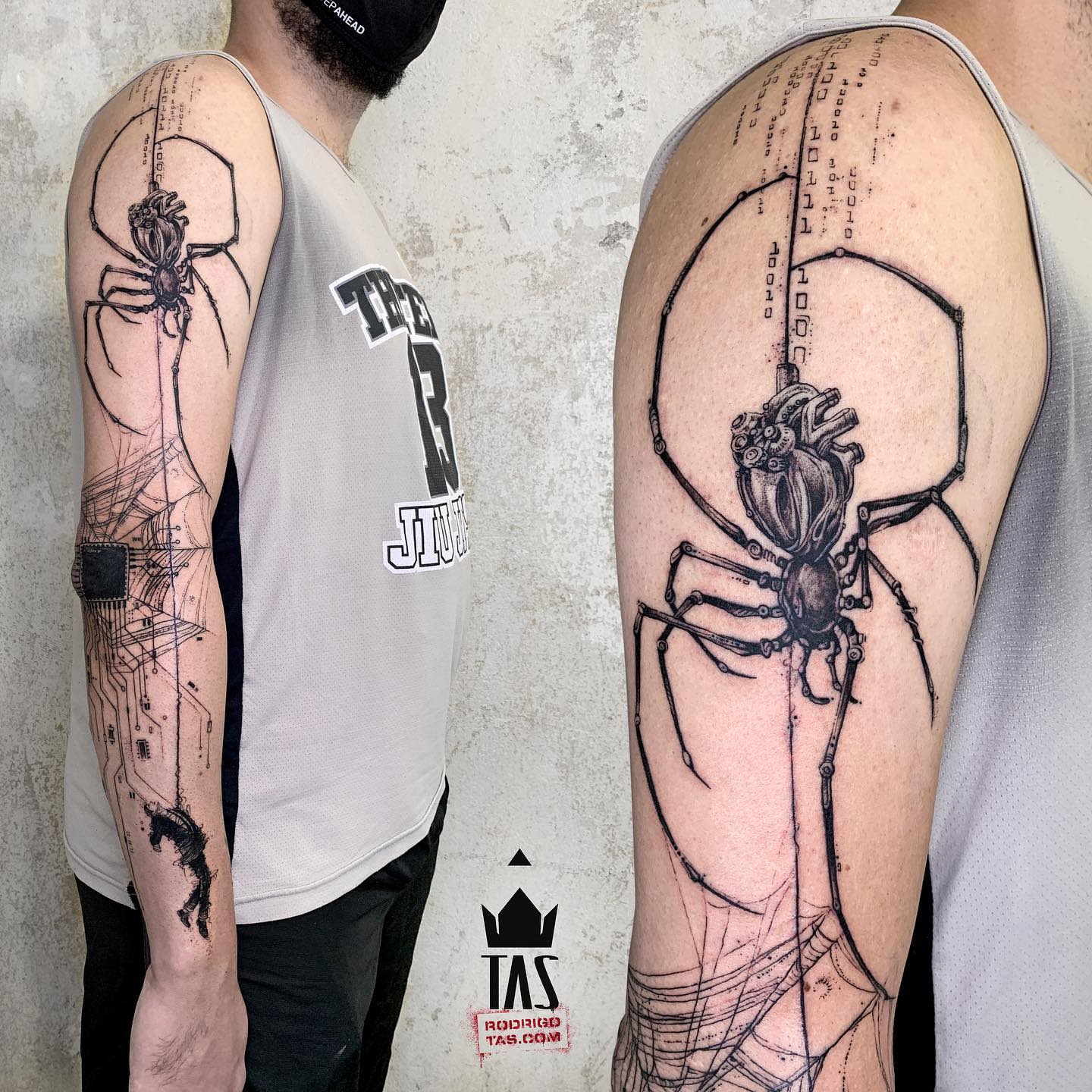 Cyberpunk arm tattoo featuring a mechanical spider with a heart-shaped body and circuit-like details